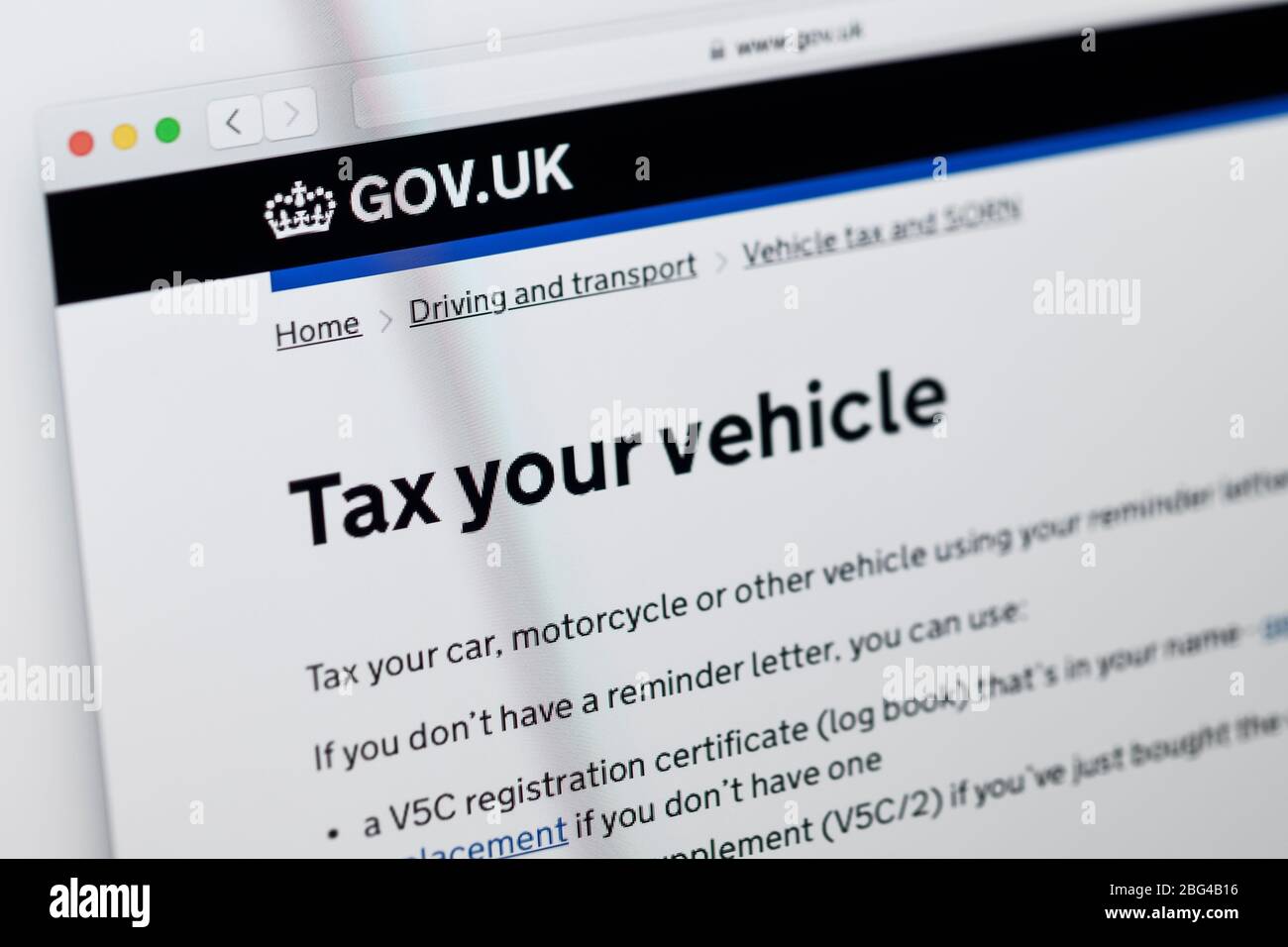 Detalle de la página principal del sitio web del gobierno británico que muestra información para hacer impuestos a su vehículo Foto de stock