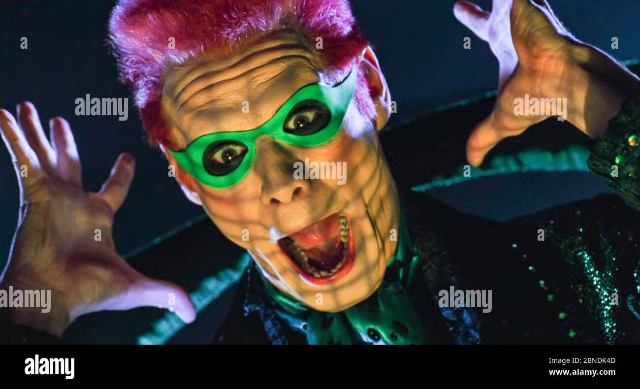 . Jim Carrey en la película de ©Warner Bros : Batman Forever (1995) .  Argumento: Batman debe luchar contra el ex fiscal de distrito Harvey Dent,  que ahora es de dos caras