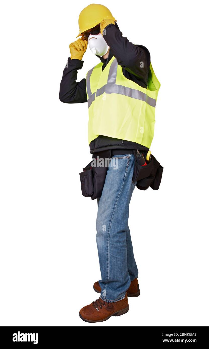 Construcción Hombre trabajador usando máscara de seguridad Sombrero duro Reflective Vest and Tool Belt. Foto de stock