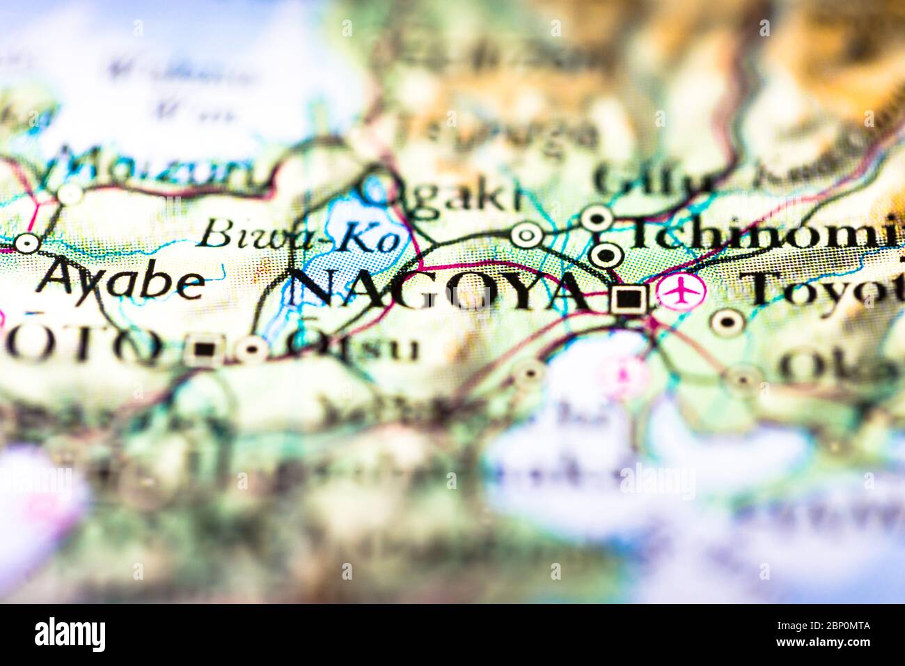 Profundidad de campo reducida se centra en la ubicación del mapa geográfico de la ciudad de Nagoya en la isla Honshu Japón continente asiático en el atlas Foto de stock