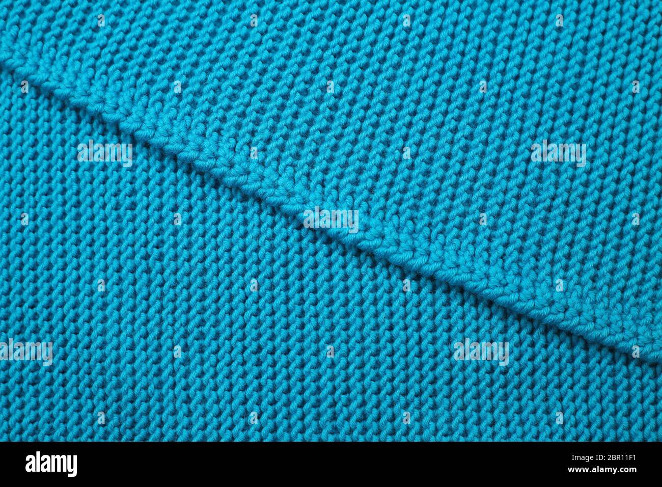 Un auto-manta de lana tejida hecha de algodón azul Foto de stock