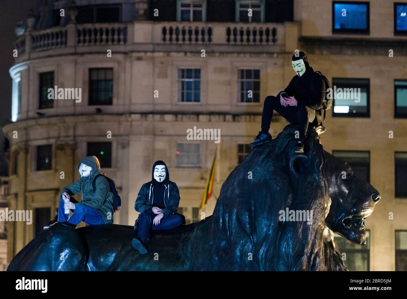 La "marcha de la Máscara del león" ve protestas llevando V para el estilo de Vendetta Guy Fawkes máscaras y demostrando contra la austeridad, la violación de la ri civil Foto de stock