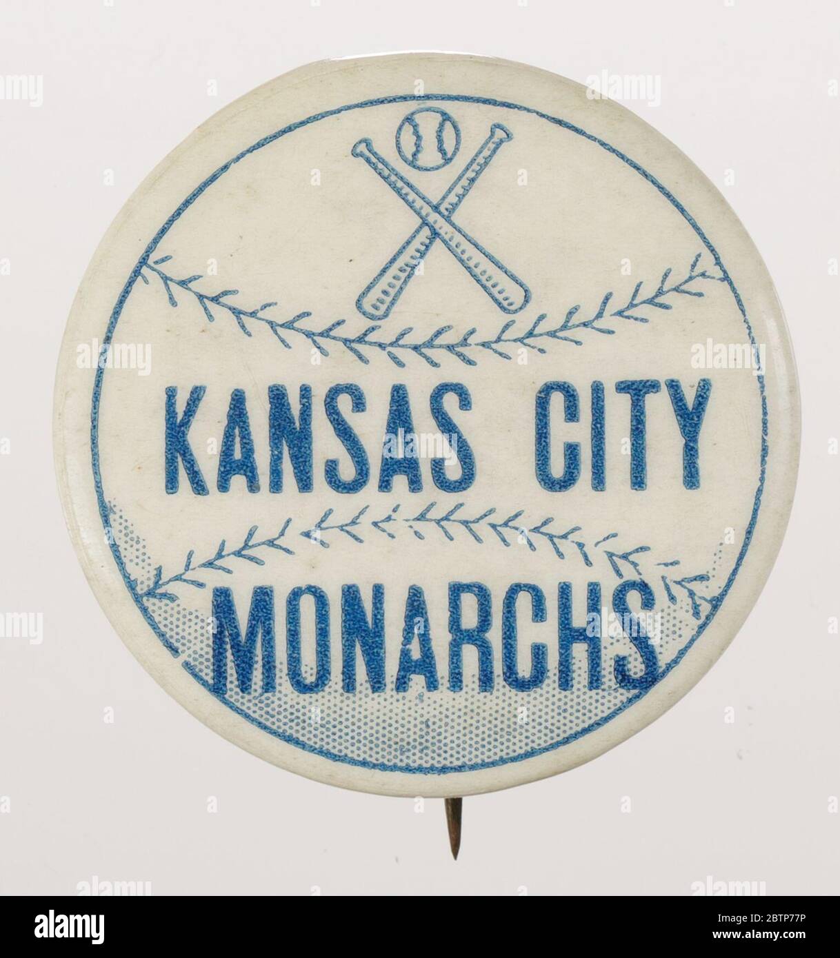 Botón Pinback para los Reyes de Kansas City. Botón de los Reyes de Kansas  City con el pasador metálico. La parte frontal del botón tiene un fondo  blanco con un dibujo de