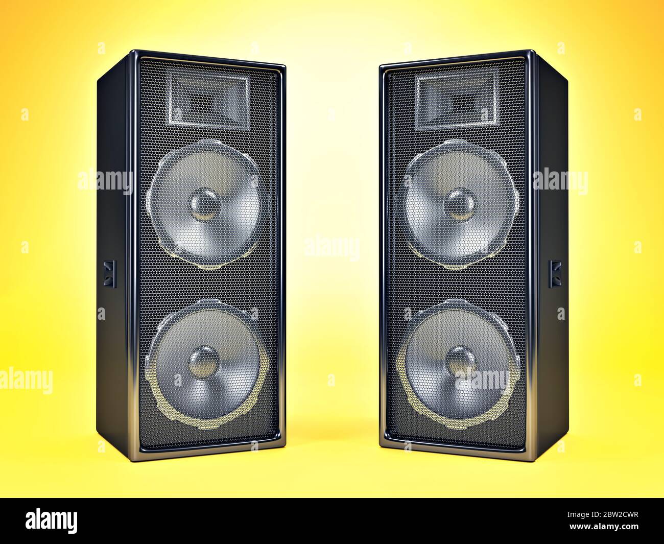 Dos altavoces grandes del sistema de sonido en material negro brillante,  sobre fondo amarillo Fotografía de stock - Alamy