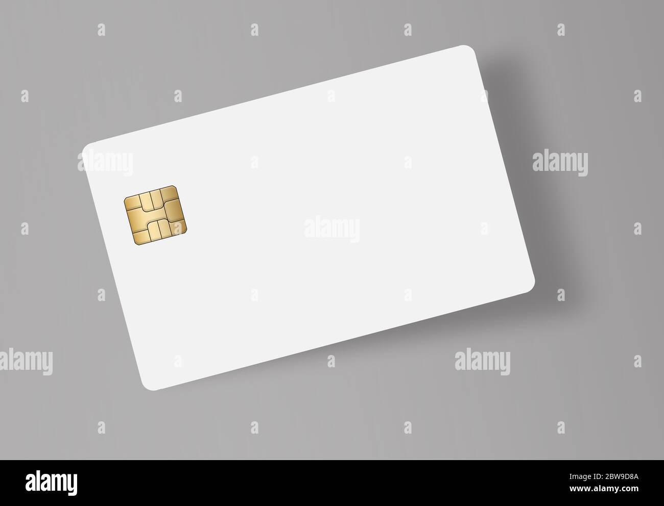 Aquí está una tarjeta blanca de crédito o débito con un chip EMV dorado. Área de texto. Copiar área. La tarjeta proyecta una sombra sobre un fondo gris claro. Foto de stock