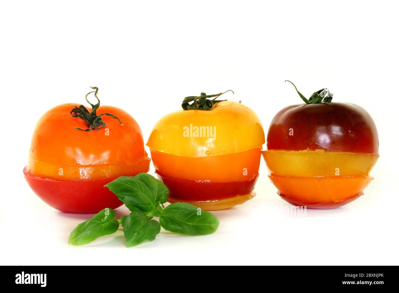 Capas de tomates multicolores Foto de stock