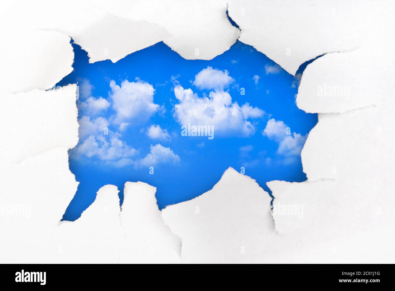 Agujero de papel y cielo Foto de stock