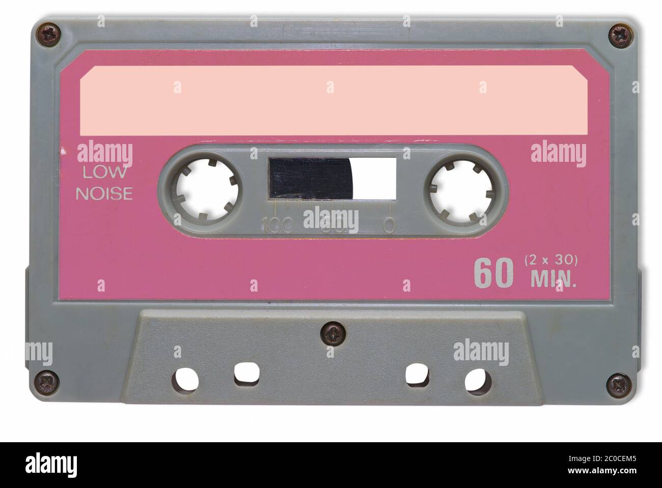 cinta de audio gris y rosa vintage recortada sobre fondo blanco. Foto de stock
