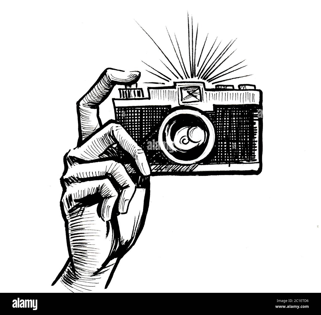 Dibujo De Una Camara De Fotos Mano con una cámara retro. Dibujo en blanco y negro Fotografía de stock -  Alamy