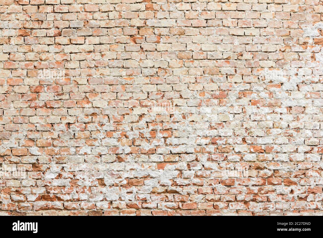 Muro de ladrillo urbano sucio. Textura y concepto de diseño. Foto de stock