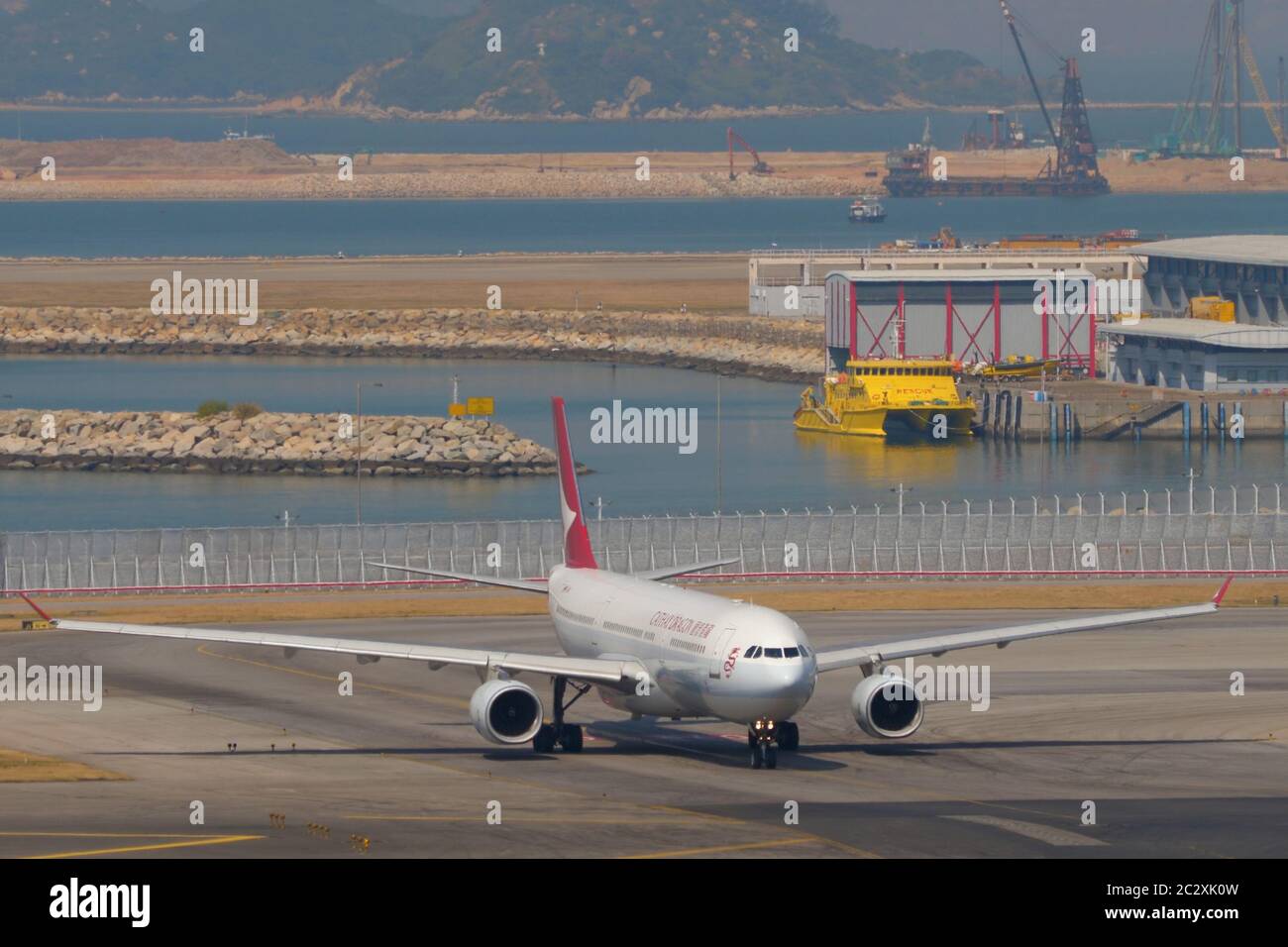 Avión en Hong Kong Foto de stock