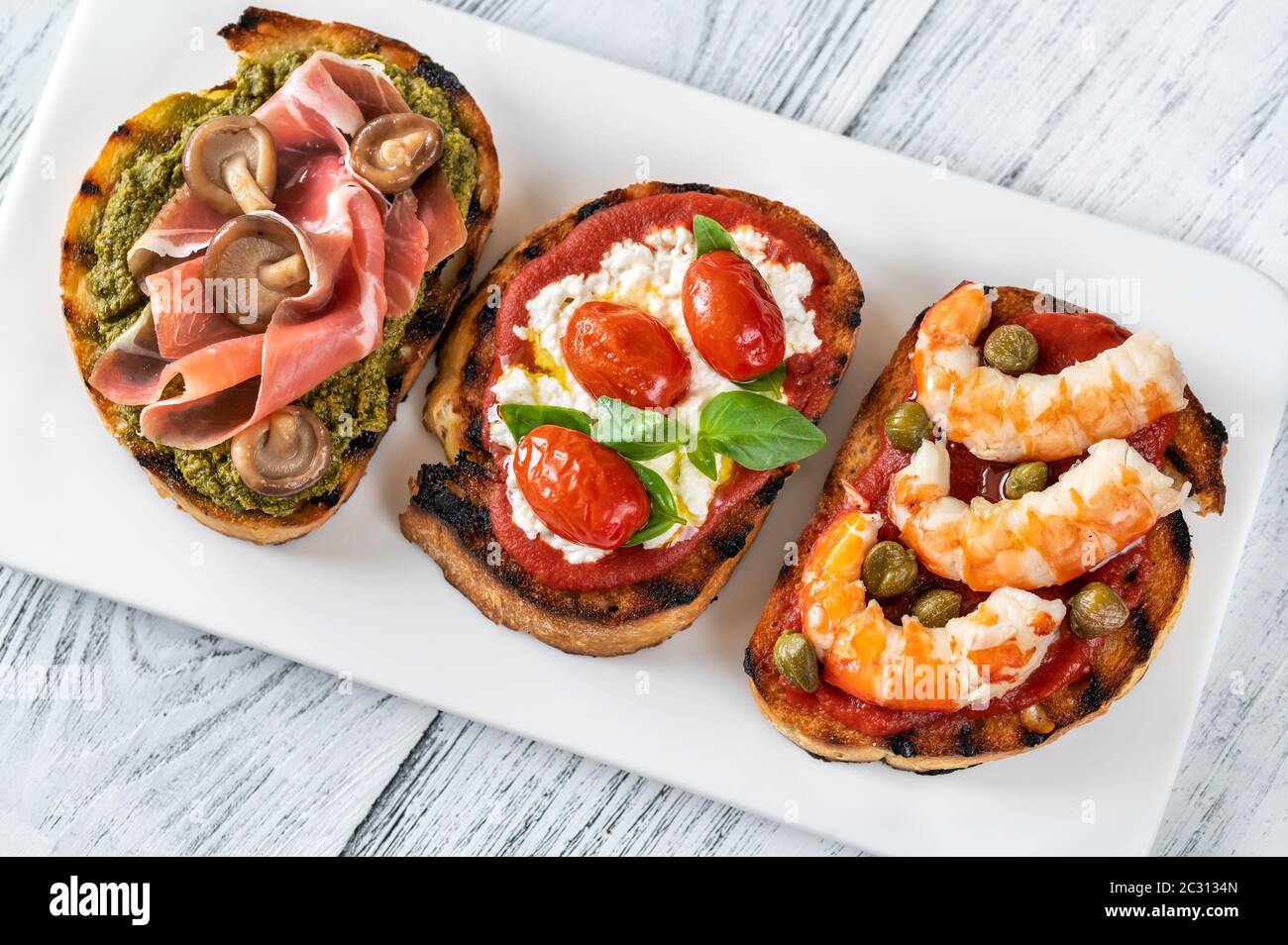 Surtido De Bruschettas Italianas Con Diferentes Ingredientes Fotograf a
