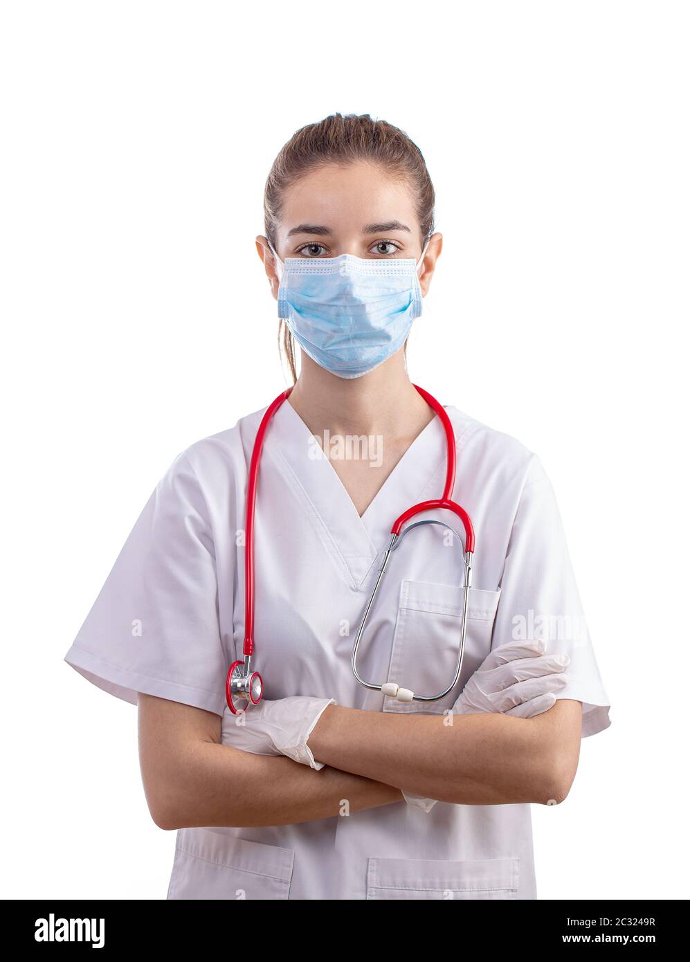 Mujer joven enfermera profesional o médico vestido con ropa blanca de hospital de stock Alamy