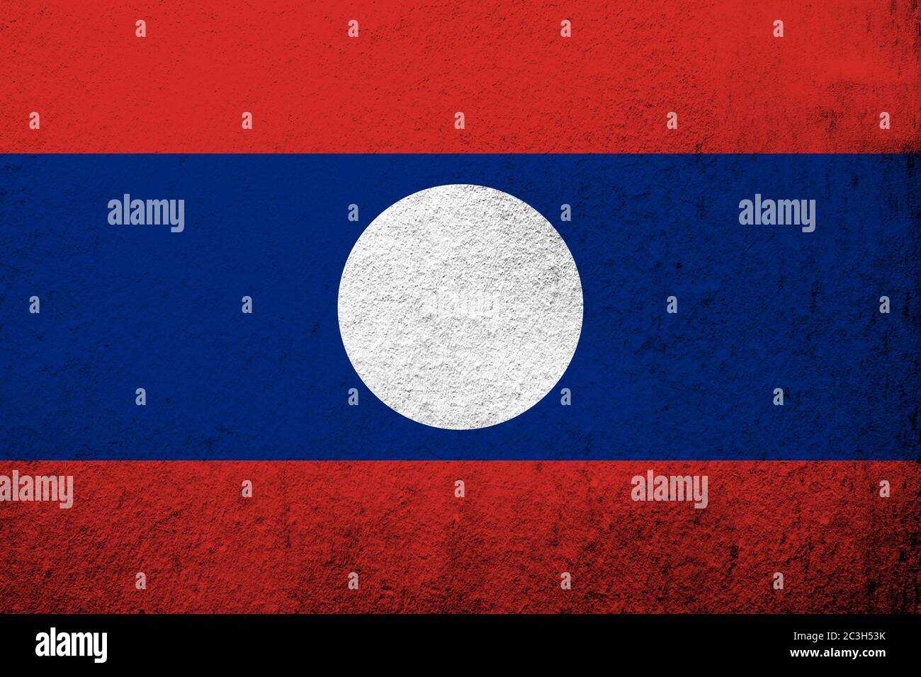 Bandera nacional de la República Democrática Popular Lao (Laos). Grunge fondo Foto de stock