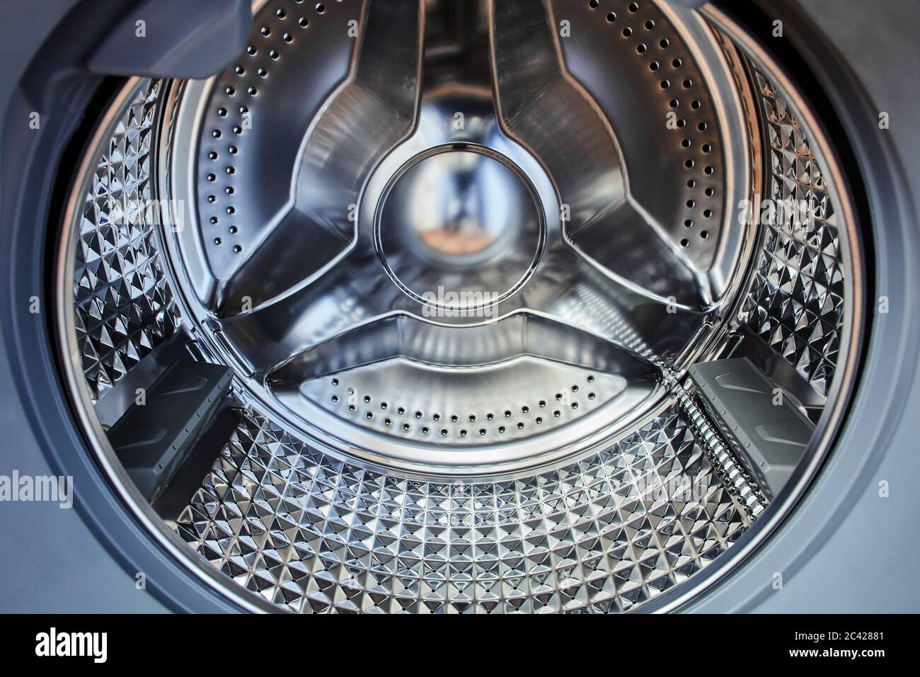 Diseño de diamante de tambor de acero vacío de la lavadora automática de  carga frontal Fotografía de stock - Alamy