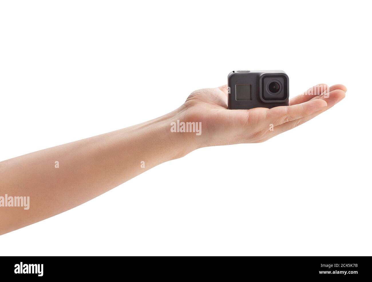 cámara de acción en el camino de mano aislada sobre blanco Foto de stock