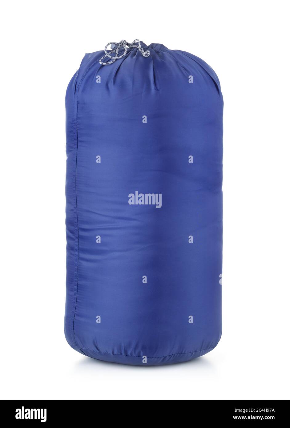 Bolsa de dormir azul embalada aislada sobre blanco Foto de stock
