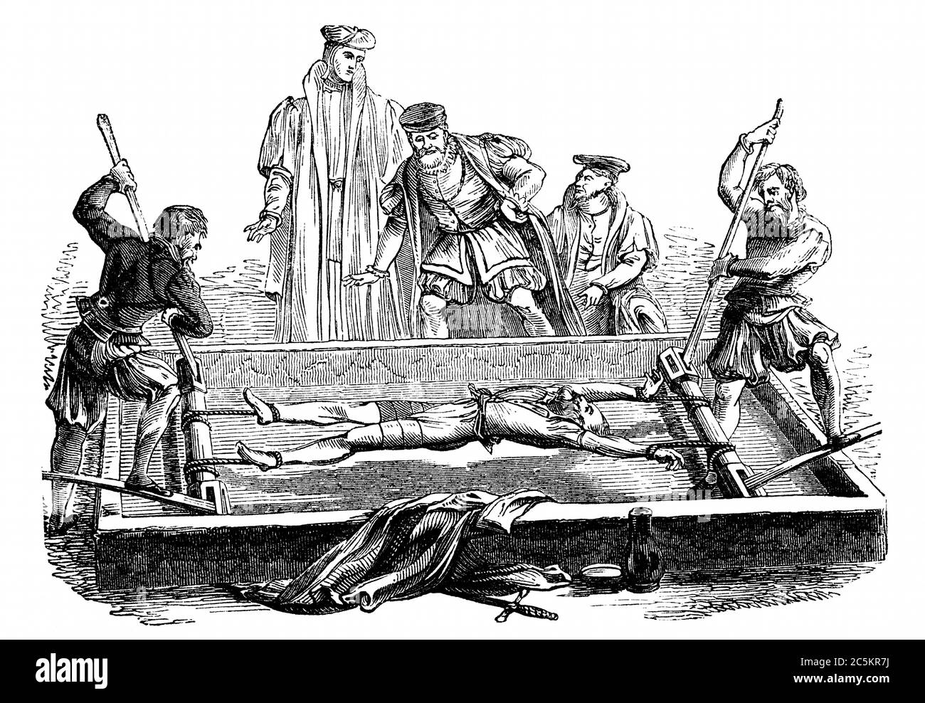 Una imagen grabada de una víctima siendo torturada en un bastidor medieval de la Edad Media en Inglaterra, Reino Unido, de un libro victoriano de 1868 que no es l Foto de stock