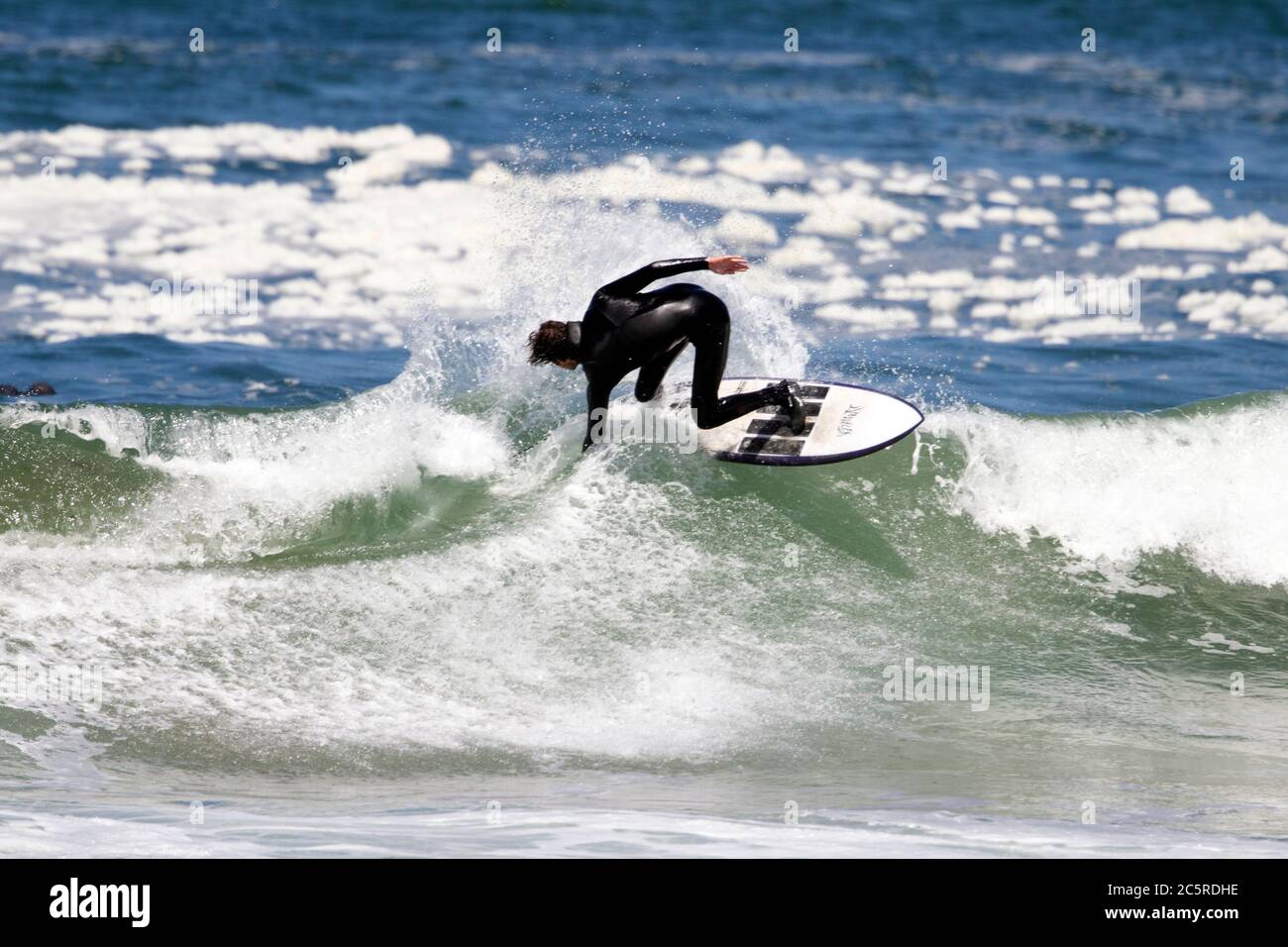 Surfista en Morro Bay Foto de stock