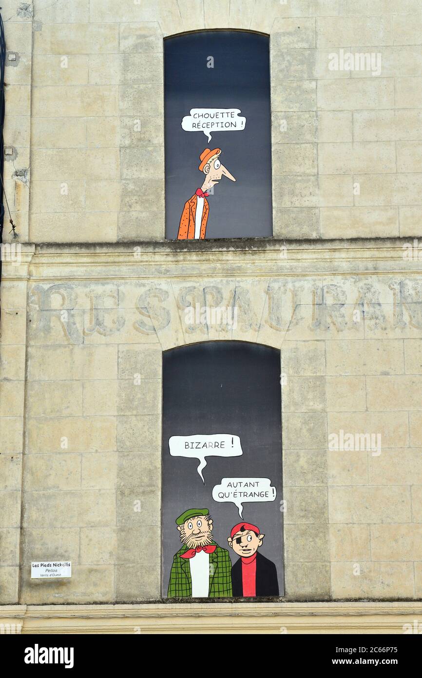 Francia, Charente, Angouleme, paredes pintadas a pie, mural Les pieds Nickelés de Pellos Foto de stock