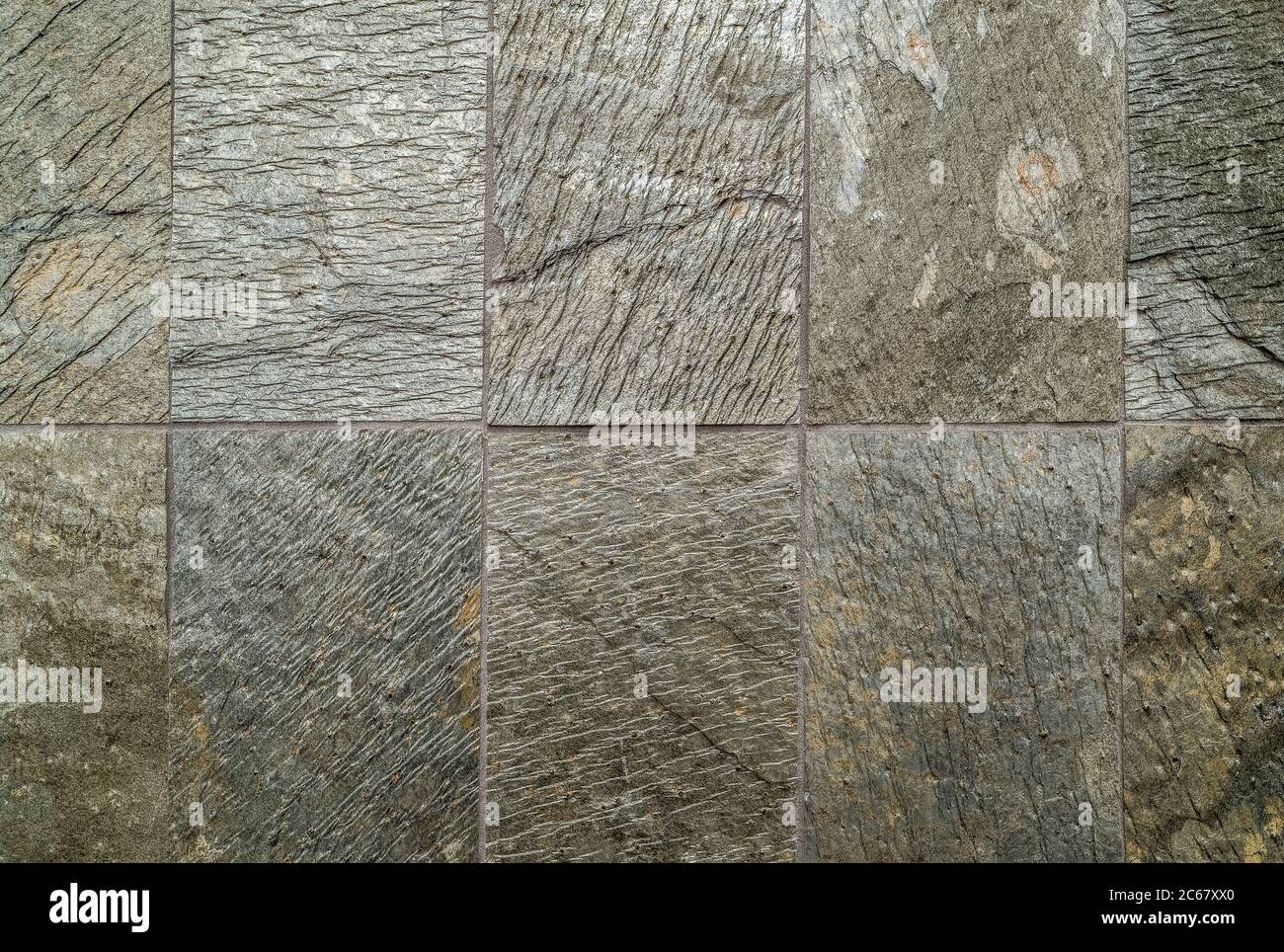 Textura con primer plano de la pared de baldosas de piedra Foto de stock