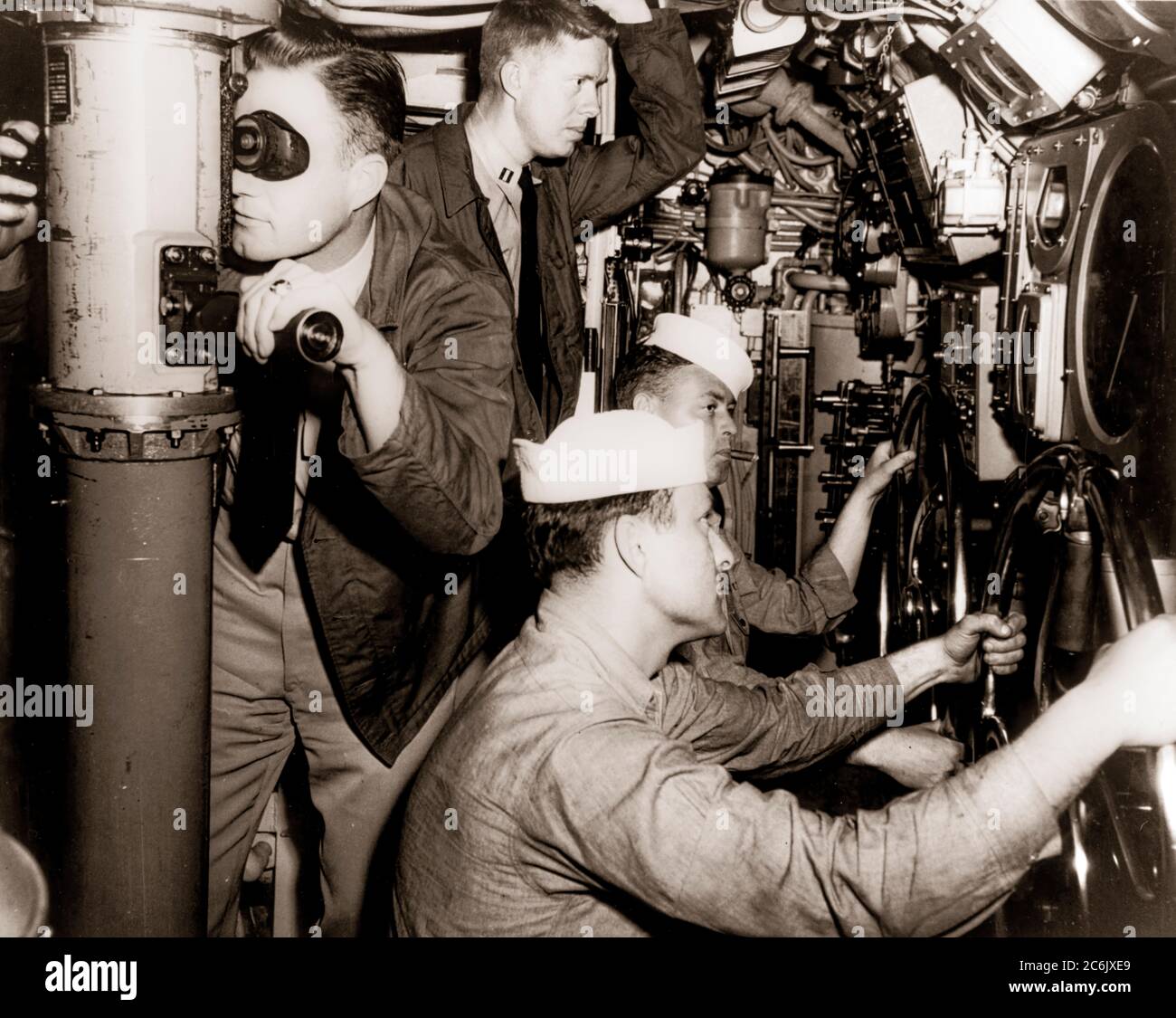 El teniente Jimmy Carter en su lugar de destino a bordo de un submarino de  la Marina de los Estados Unidos justo después de la Segunda Guerra Mundial.  Presidente James Earl (Jimmy)
