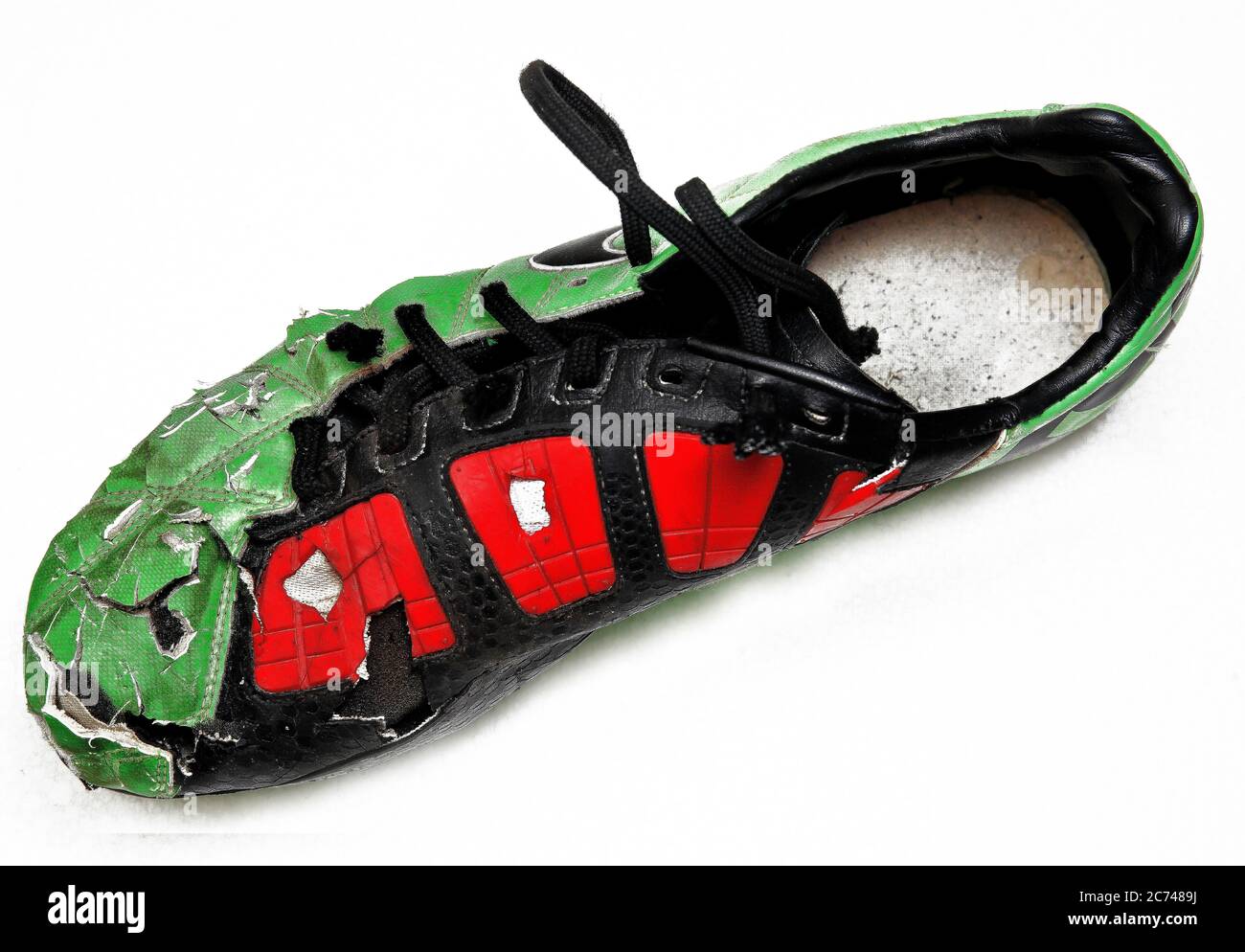 Botas de fútbol rotas Fotografía de stock - Alamy