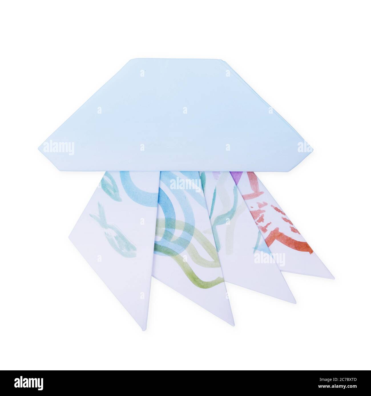 Lindo papel de origami jellyfish dibujos animados en un blanco Foto de stock