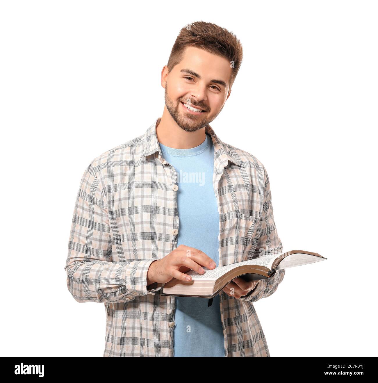 Joven leyendo la Biblia sobre fondo blanco Fotografía de stock Alamy