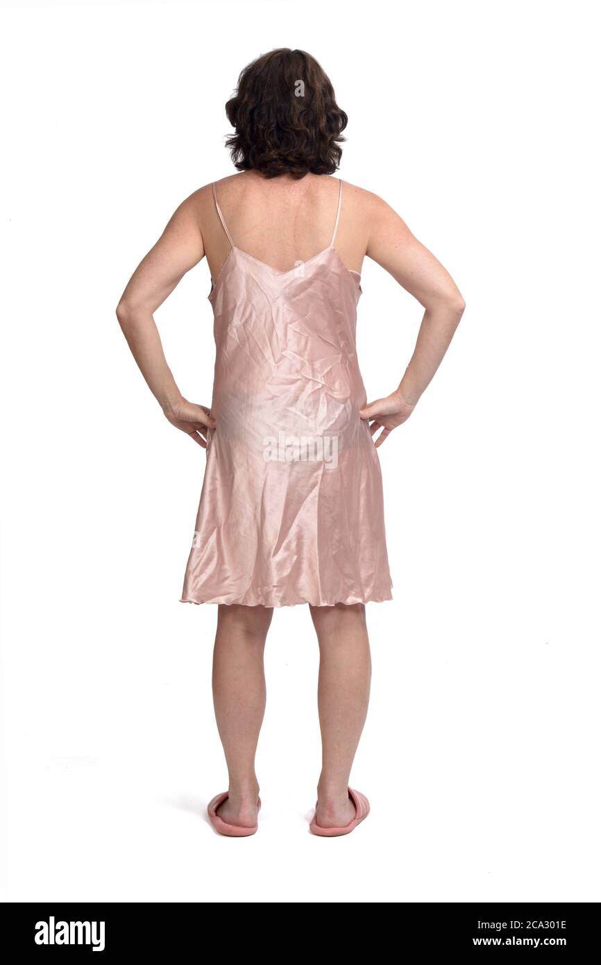 vista de una mujer con camisón sobre fondo blanco, manos sobre la Fotografía de stock - Alamy