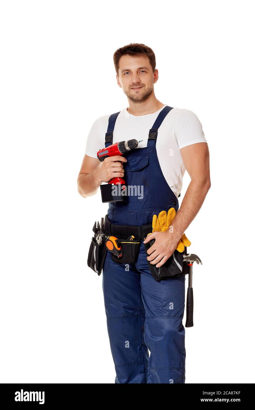 Hombre trabajador guapo con cinturón de herramientas