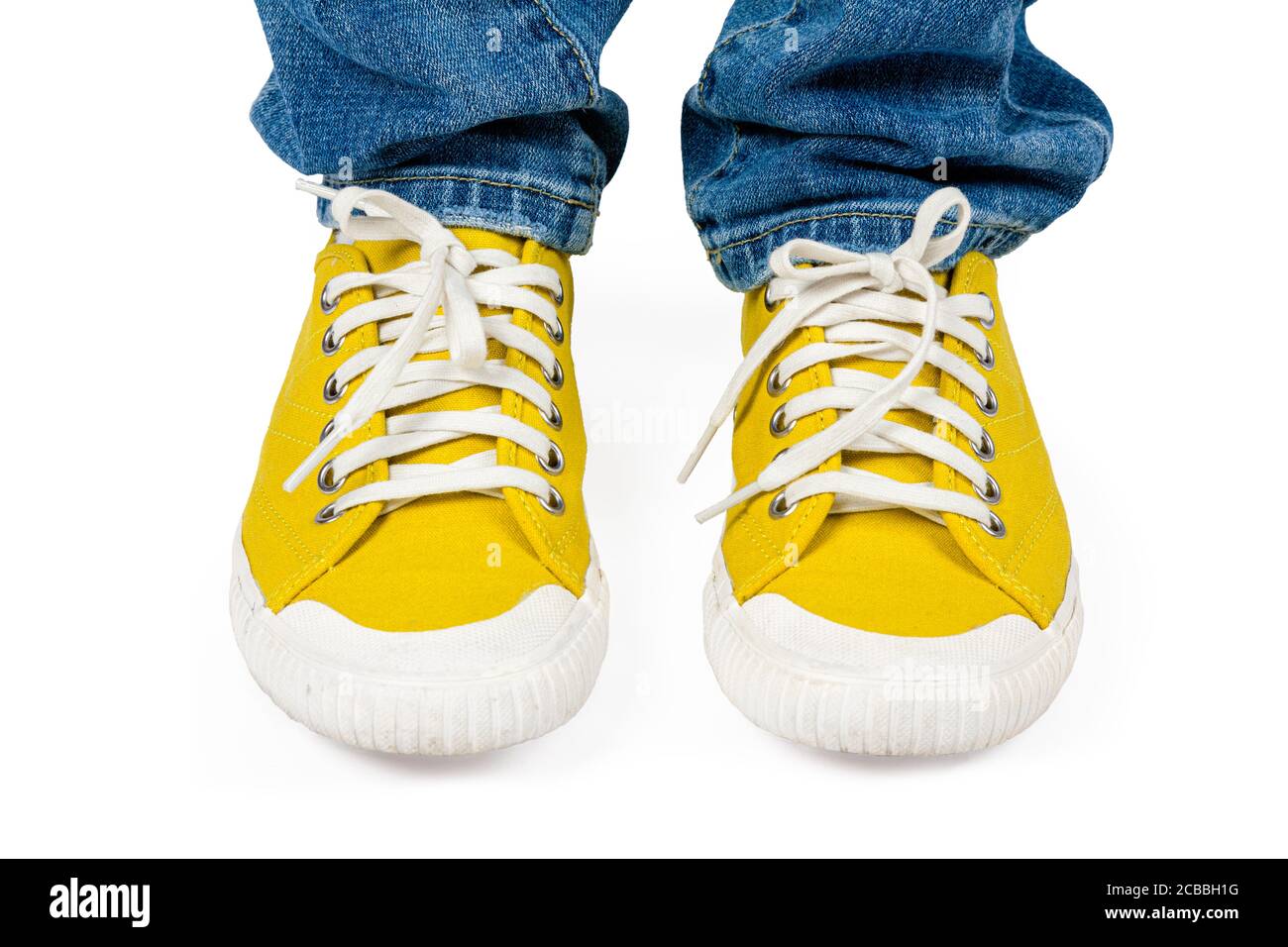 Zapatillas amarillas Imágenes recortadas de stock - Alamy