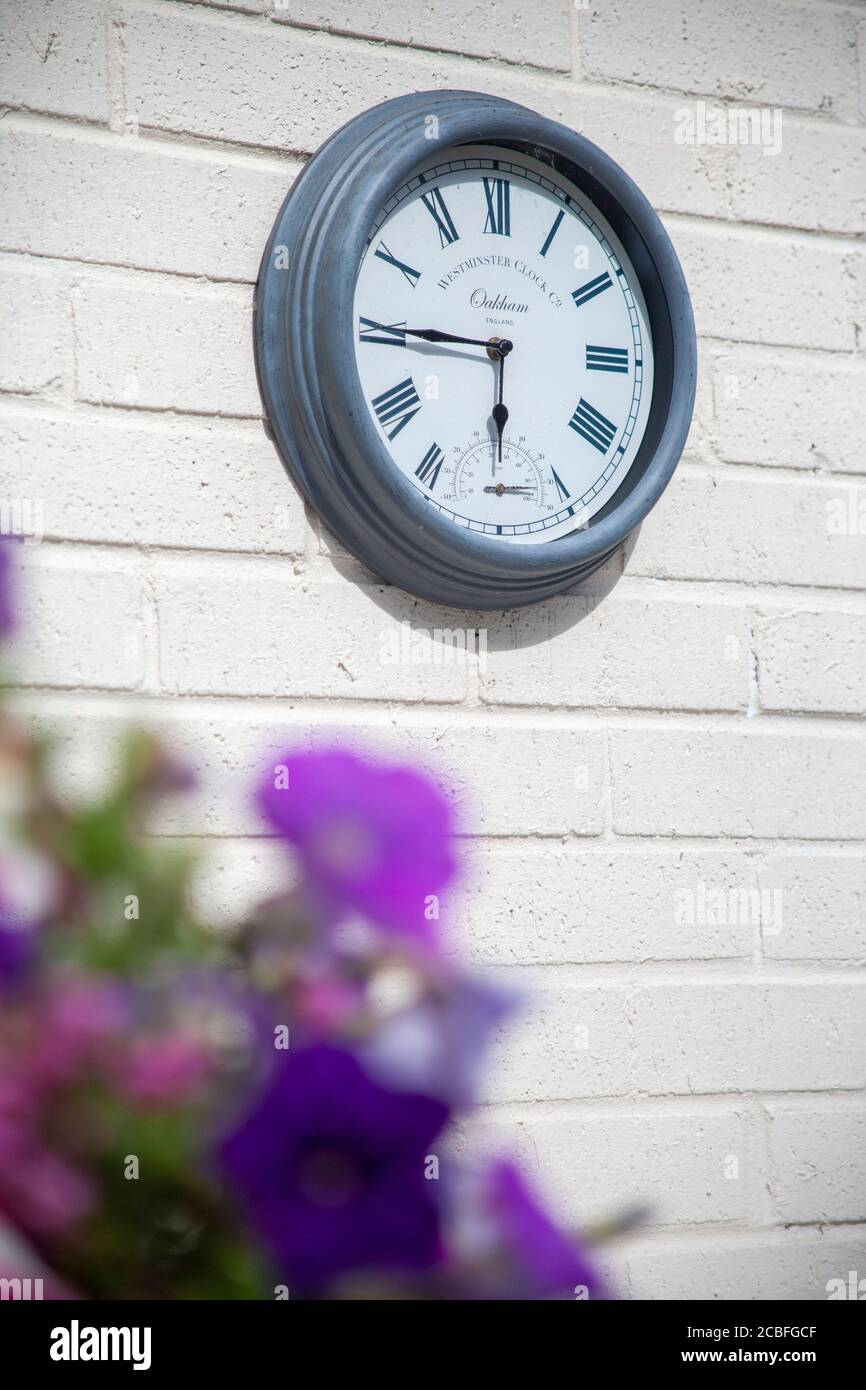Reloj exterior jardín sale