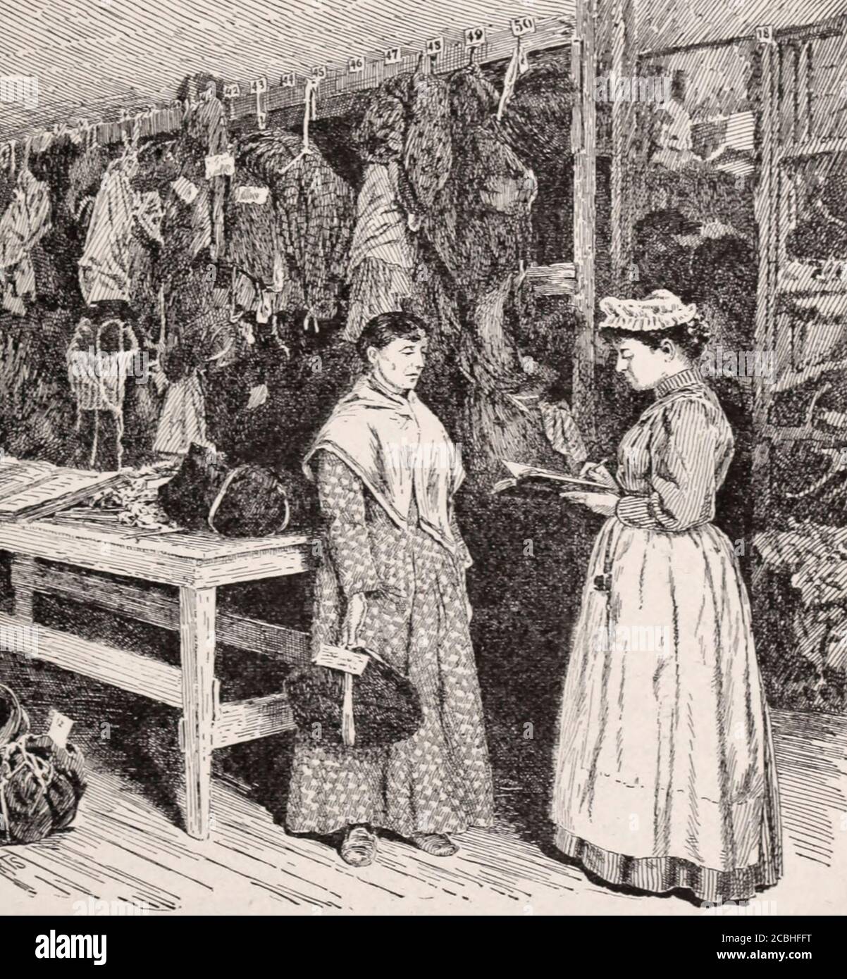 Dado de alta - una paciente recibiendo su paquete de ropa en la habitación  de ropa vieja en el Hospital Bellevue. Ciudad de Nueva York, alrededor de  1892 Fotografía de stock - Alamy