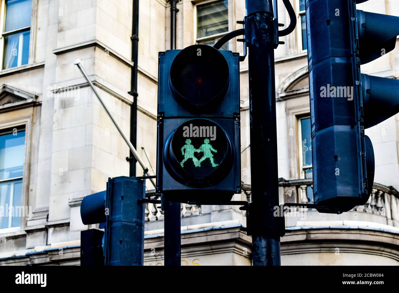 Un par de luces peatonales en Londres Foto de stock