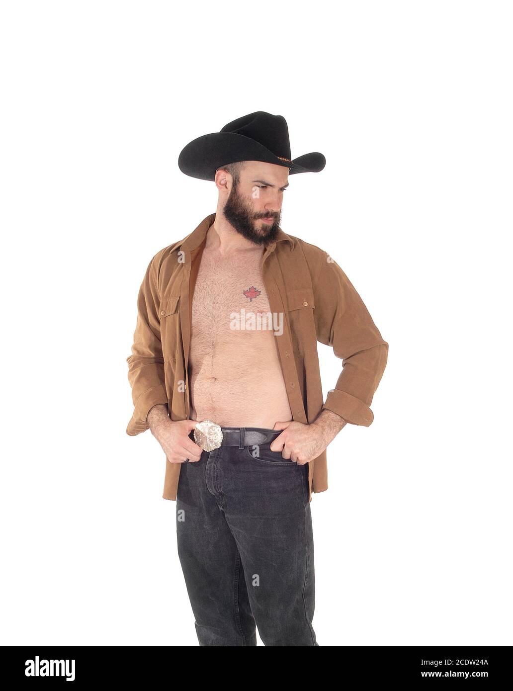 Joven con sombrero de cowboy y camisa abierta Foto de stock