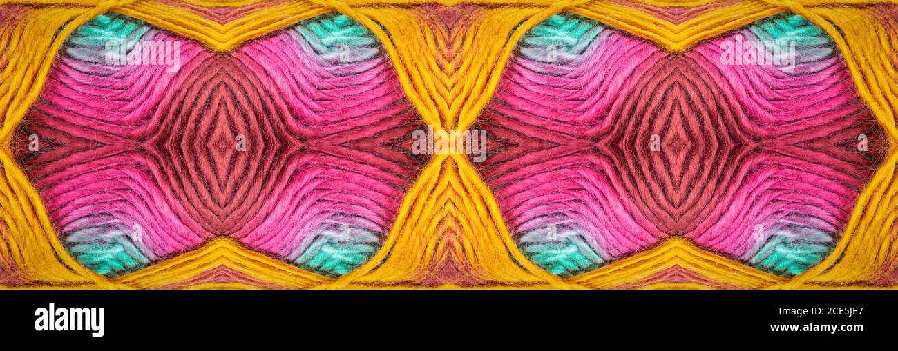 título abstracto de la bandera de hilos de lana en la bola de lana, fondo colorido o encabezado Foto de stock