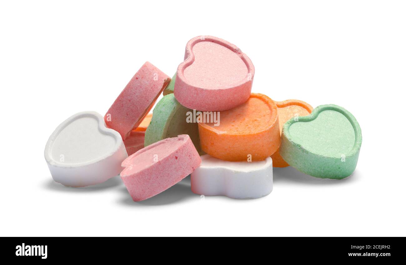 Valentines Candy corazón Pile aislado en blanco. Foto de stock
