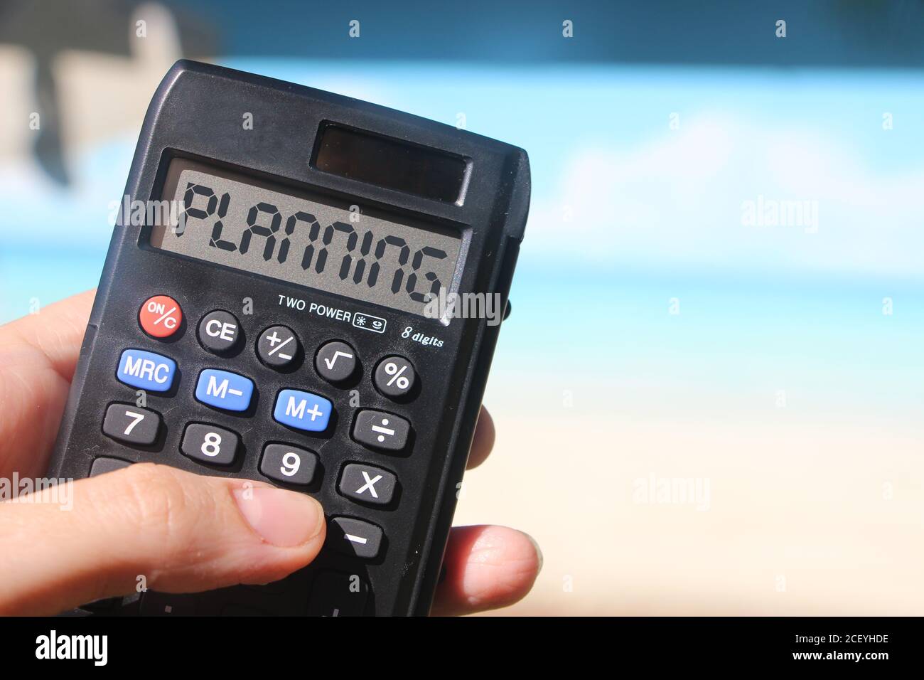 Calculadora texto Planificación en pantalla. Turismo de negocios o concepto  de trabajo a distancia Fotografía de stock - Alamy