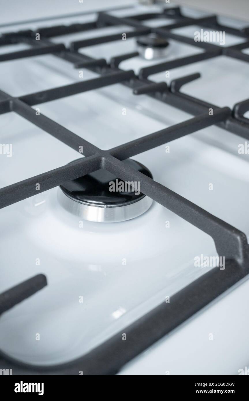 foto del quemador de gas de la placa del horno en un ángulo dinámico.  Primer plano de un quemador apagado Fotografía de stock - Alamy
