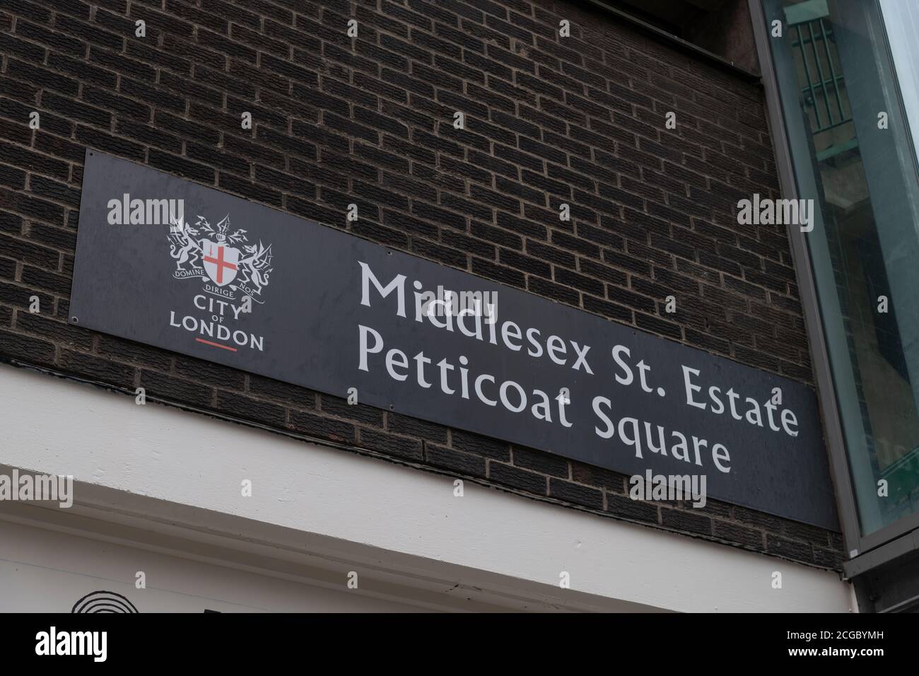Señal para Middlesex St. Estate, Petticoat Square Foto de stock