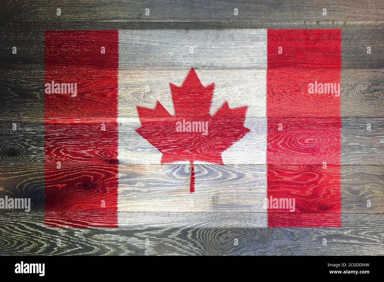 Bandera de Canadá sobre fondo de madera antigua rústica Foto de stock