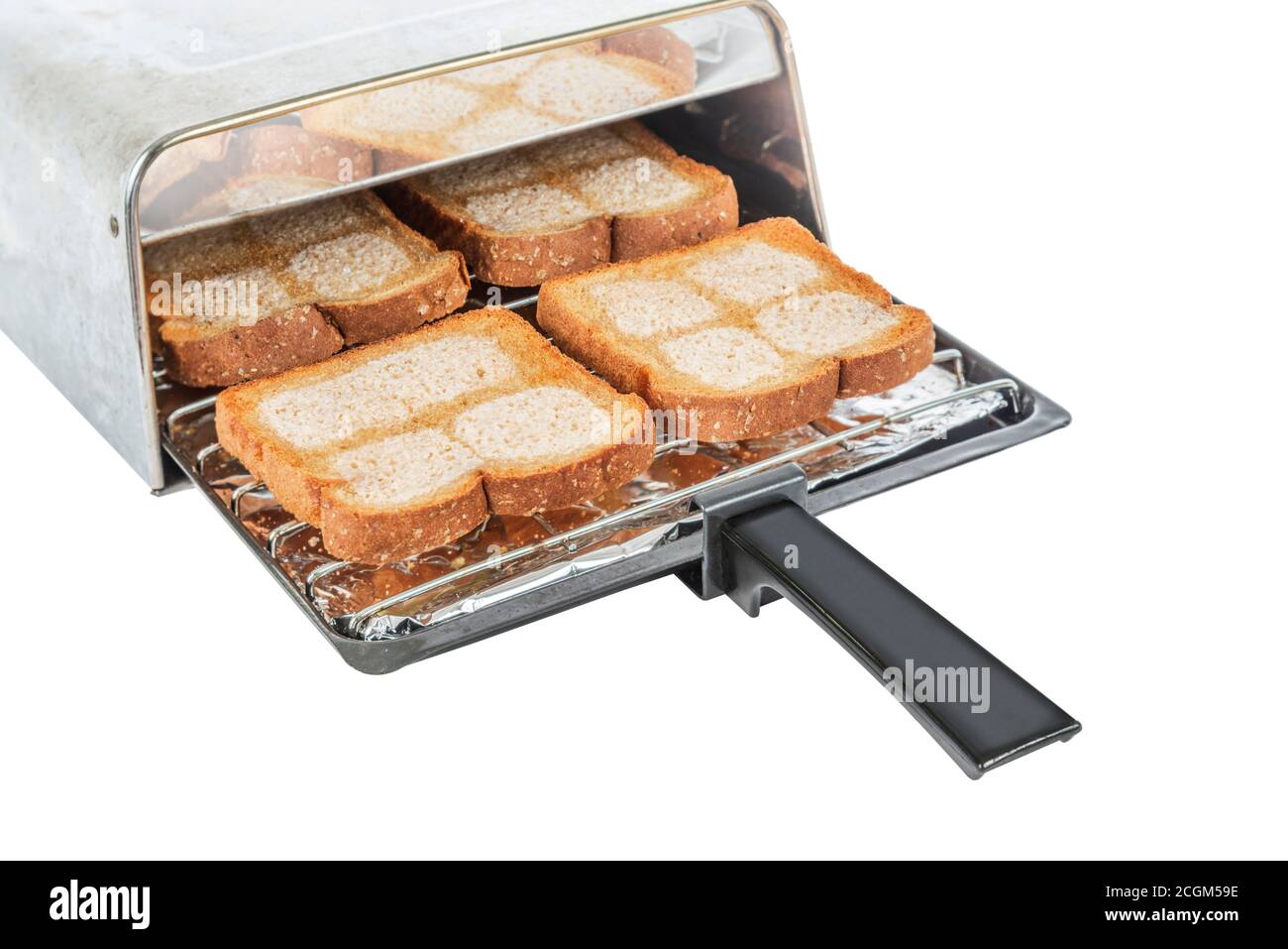 Tiro horizontal de una bandeja de tostador con cuatro trozos de pan de  trigo con mantequilla saliendo de una tostadora Fotografía de stock - Alamy