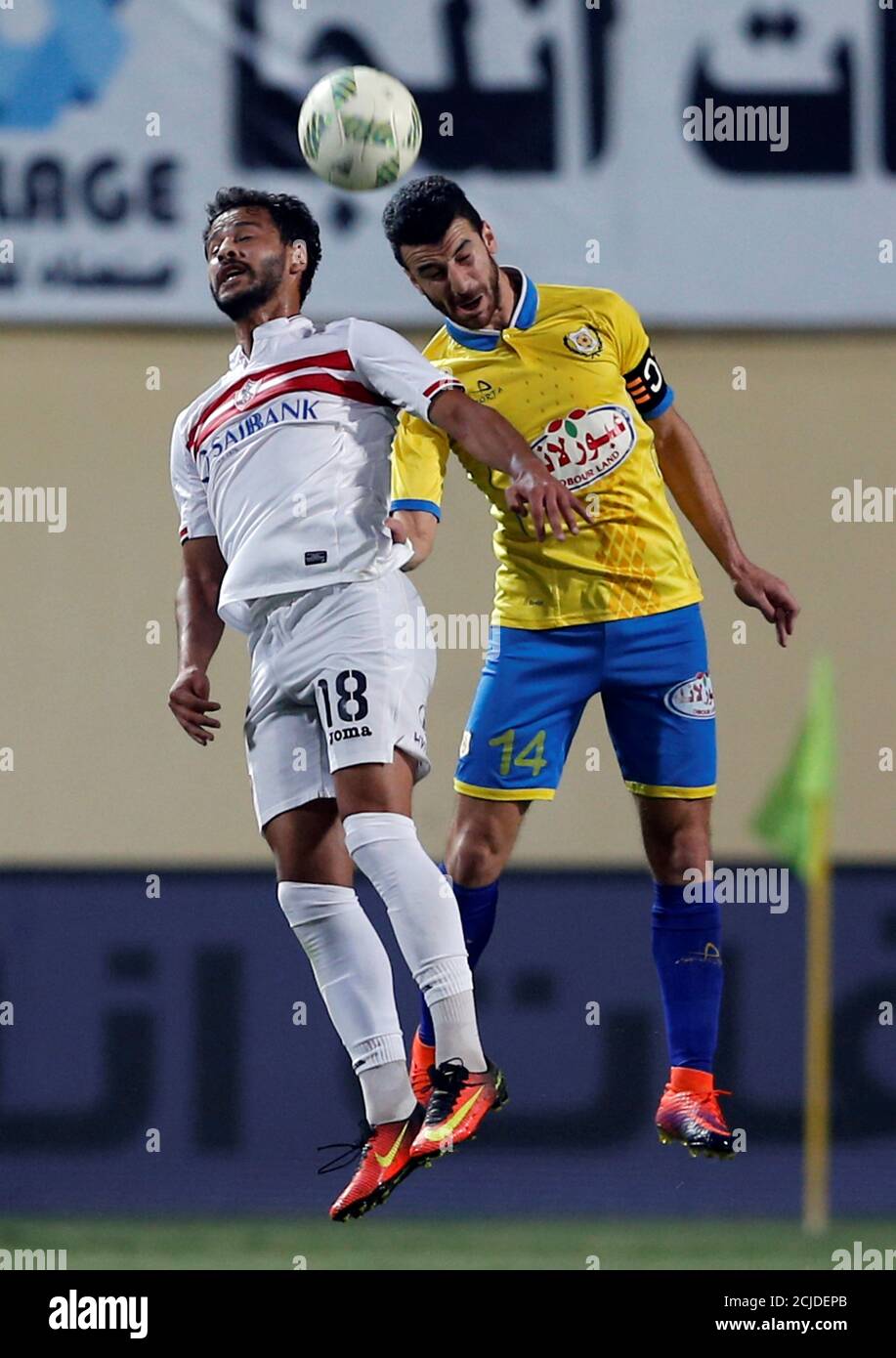Football Soccer - Egyptian Premier League - El Zamalek v El Ismaily - Petro  Sport Stadium, Cairo, Egypt - 3/5/17 - Mahmoud Metwalli of El Ismaily and  Ahmed Refaat of El Zamalek