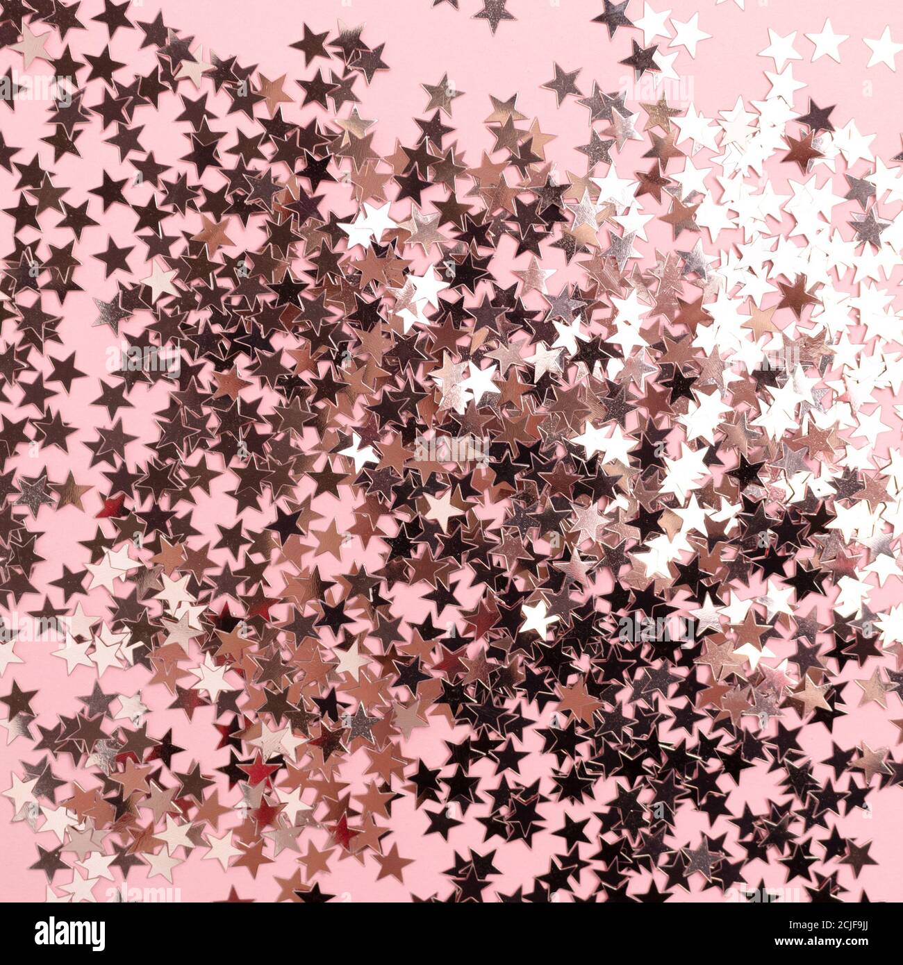 Textura de estrellas brillante sobre fondo rosa pastel. Concepto  monocromático Fotografía de stock - Alamy
