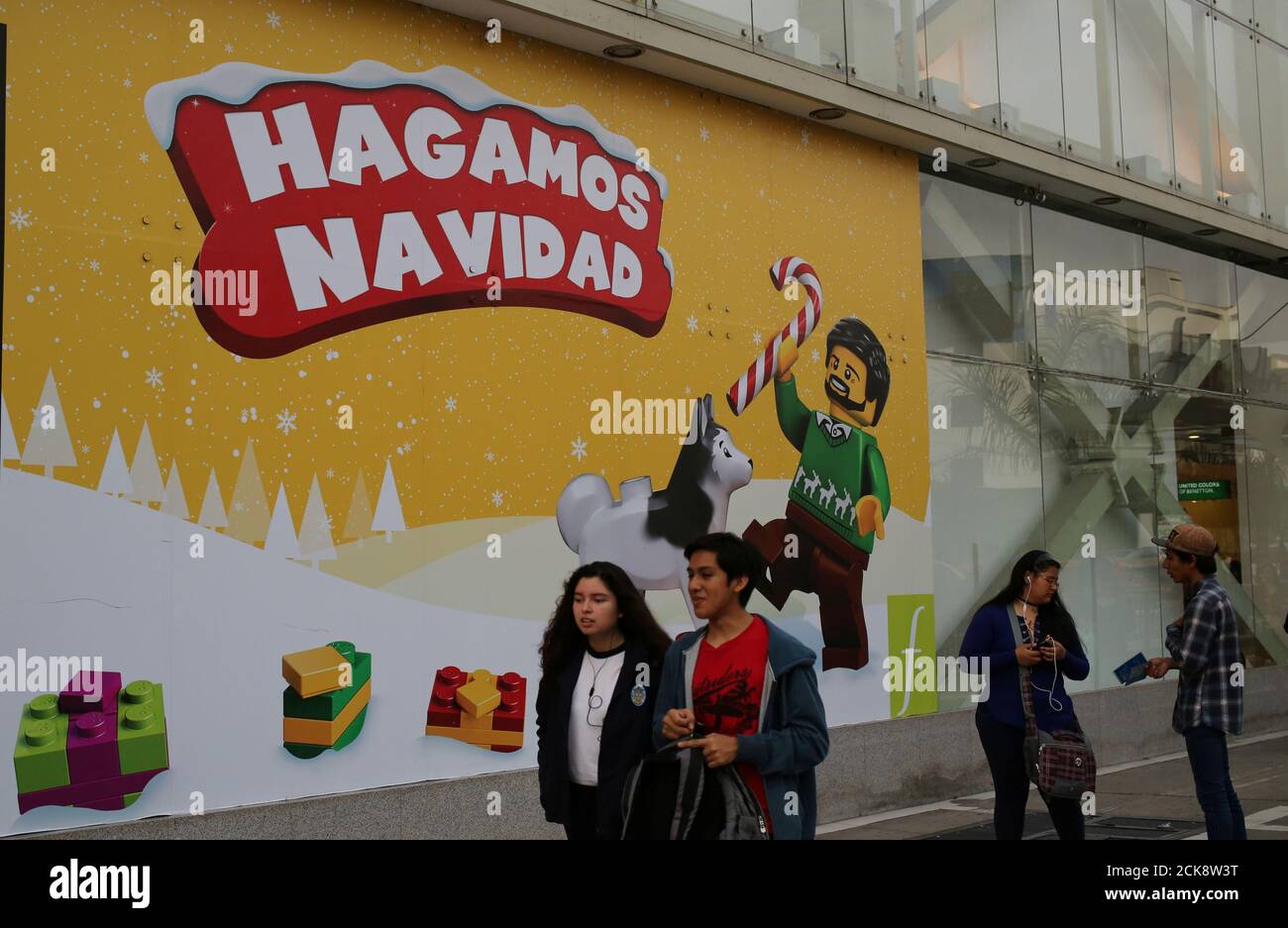 People walks past an advertisement of Lego for Christmas at a Saga Falabella  department store in the Miraflores district of Lima, December 7, 2016.  REUTERS/Mariana Bazo Fotografía de stock - Alamy