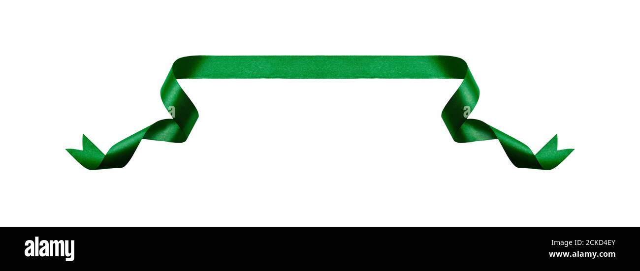 Una cinta verde rizado Navidad, cumpleaños presente bandera aislada contra un fondo blanco. Foto de stock