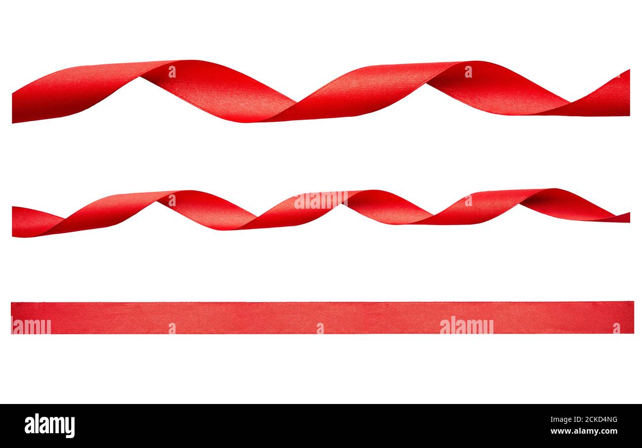 Un conjunto de cinta roja rizado para regalo de Navidad y cumpleaños aislado contra un fondo blanco. Foto de stock
