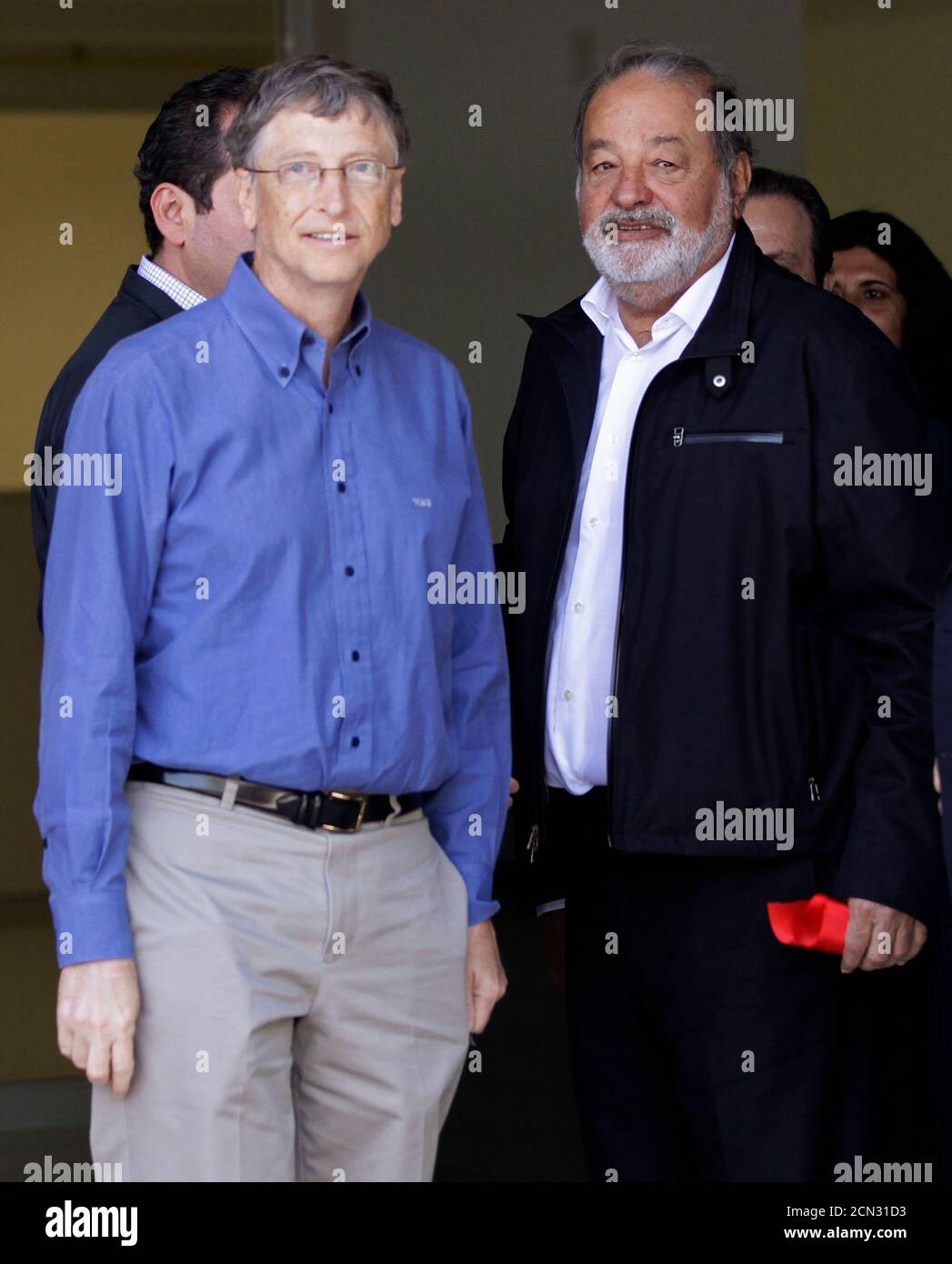 Mexican businessman Carlos Slim (R) stands with Microsoft founder and  philanthropist Bill Gates after taking part in the inauguration of a new  research facility at the International Maize and Wheat Improvement Center (