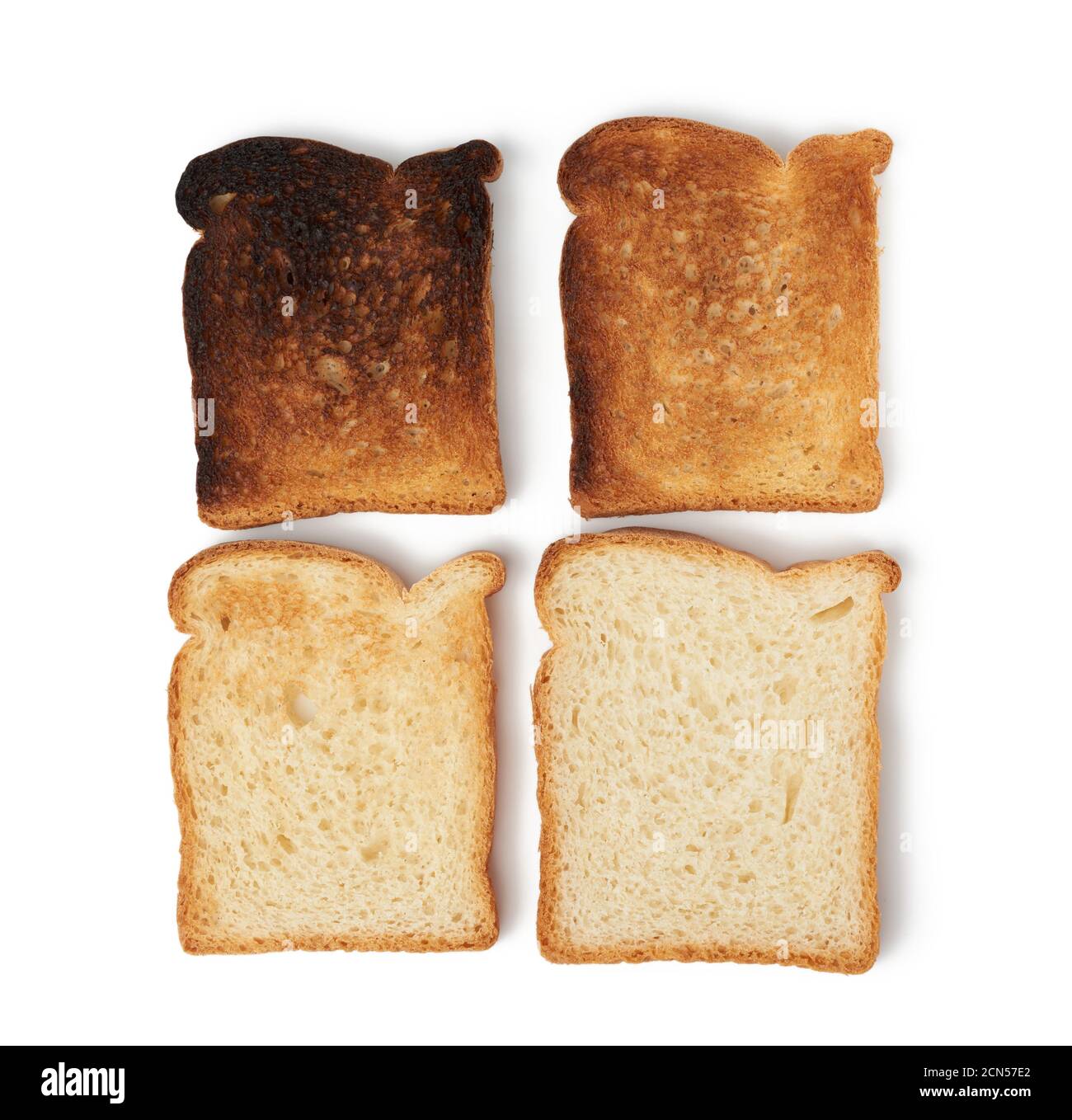 rebanadas cuadradas de pan hechas de harina de trigo blanco tostado en la  tostadora Fotografía de stock - Alamy